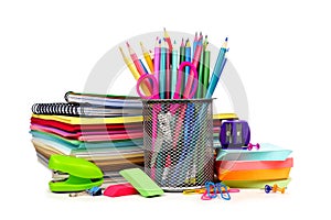 School supplies in pile isolated on a white background