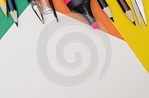 School supplies, stationery accessories on paper background.