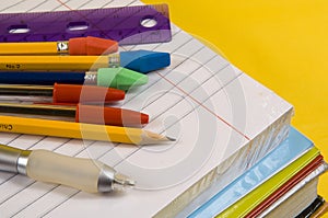 School Supplies on yellow background