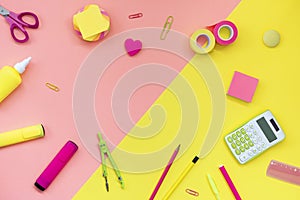 School supplies on a yellow-pink background