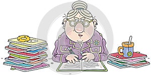 School teacher checking exercise books