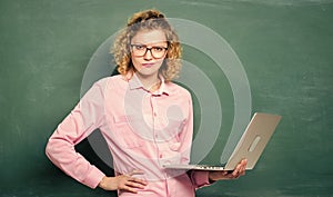 school. teacher woman at blackboard. online education. business school. modern technology. girl in modern school. e