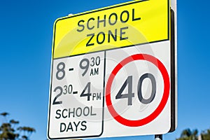 School zone road sign with speed limit 40 during before and after school hours in NSW, Australia. Road safety