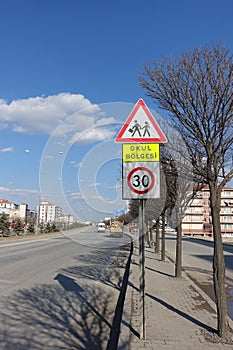 School zone and school crossing traffic sign, highway and school zone warning sign with Turkish text