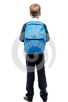 Schoolboy with backpack view from behind on white