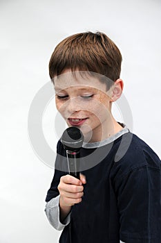 Schoolboy giving a performance and entertains the people