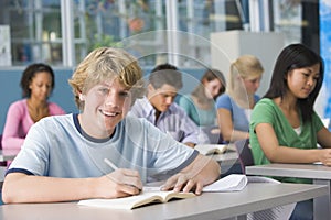 Schoolboy in high school class