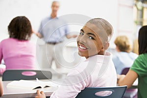 A schoolboy in a high school class