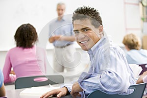 A schoolboy in a high school class