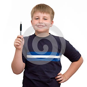 Schoolboy with a pen