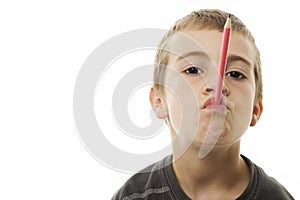 Schoolboy With a Pencil in His Mouth