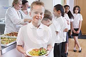 Schoolboy in a school cafeteria