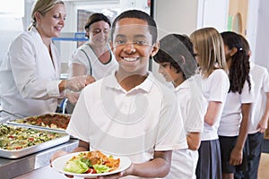 Schoolboy in a school cafeteria