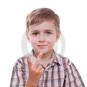 Schoolboy showing numbers with hand