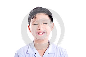 Schoolboy smiling over white background