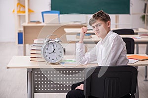 Male pupil in time management concept