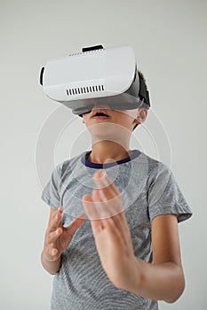 Schoolboy using virtual reality headset