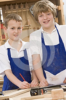 Schoolboys in woodwork class