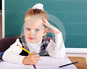 Schoolchild in classroom. photo