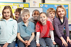 Schoolchildren In classroom photo