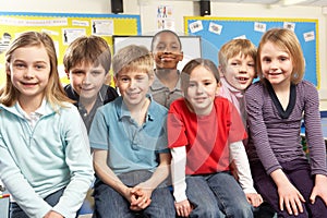 Schoolchildren In classroom photo