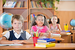 Schoolchildren in classroom at school