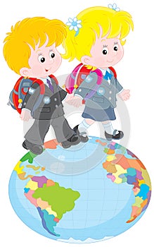 Schoolchildren going on a globe