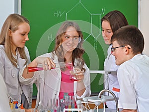 Schoolchildren in science class