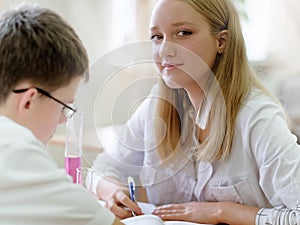 Schoolchildren in science class