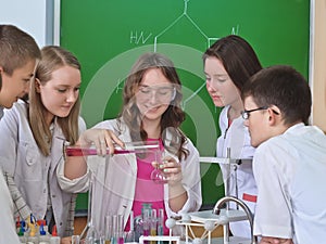 Schoolchildren in science class