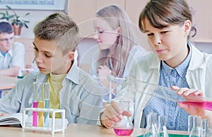 Schoolchildren in science class