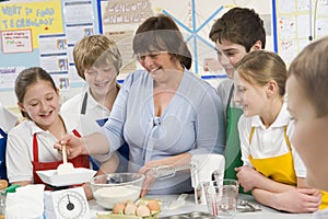 Schoolchildren and teacher in a cooking class