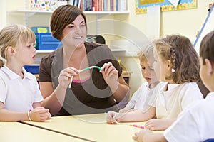 Schoolchildren and their teacher in a class