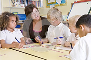 Schoolchildren and their teacher in a class