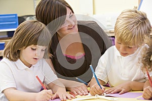 Schoolchildren and their teacher in a class