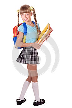 Schoolgirl with backpack holding books.