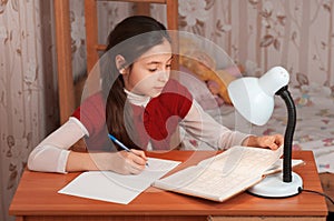 Schoolgirl doing homework