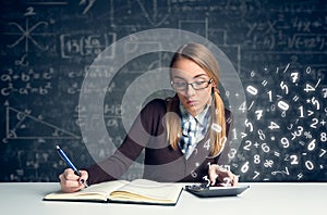 Schoolgirl doing mathematics