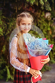 Schoolgirl with   flowers