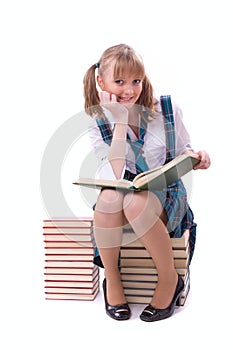 Schoolgirl is reading.