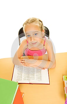 Schoolgirl reading a book photo