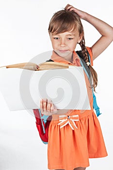 Schoolgirl reading a textbook