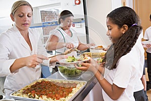 Schoolgirl in a school cafeteria