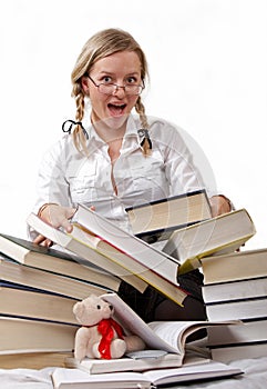 Schoolgirl or student and rolling-over books