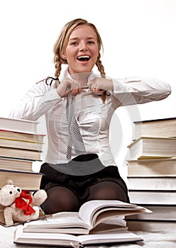 Schoolgirl or student taking off tie