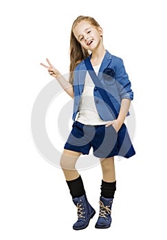 Schoolgirl in uniform showing victory sign. Student school girl