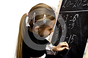 Schoolgirl wrote on the blackboard