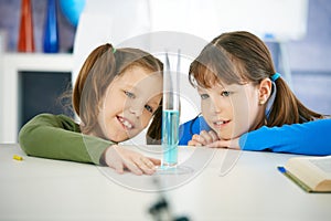 Schoolgirls in chemistry class