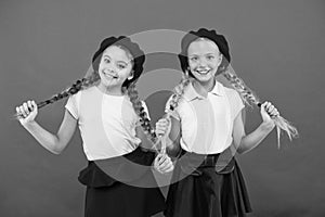 Schoolgirls french little kids smiling face posing hat red background. How to wear french beret. Beret style inspiration