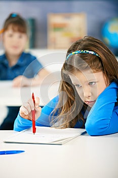 Schoolgirls writing tests photo